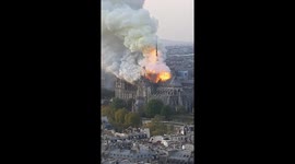 footage of notre-dame burning from the top of Sorbonne Universitty