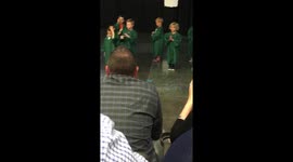Won’t face the crowd at preschool graduation