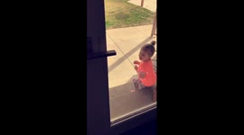 Little girl playing with bug creeps out her little sister
