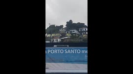 Crashed Madeira tourist bus seen on its side