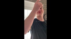 Big Brother Gets Sister to Try Quarter Trick