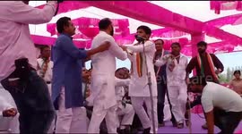 Indian politician gets slapped on stage while giving speech