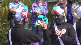 Controversial dance group 'blacks up' for annual Easter tradition