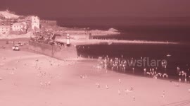 Infra Red camera captures tourists cooling off in the sea during Easter heatwave