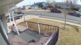 Kid not paying attention after throwing water balloon