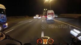 Near miss. Biker nearly gets hit by car driver