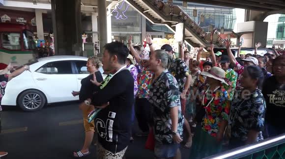 A fun Songran procession near Siam Center, Bangkok