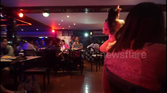 The hilarious moment when the toddler cannot stop staring at the cabaret dancer