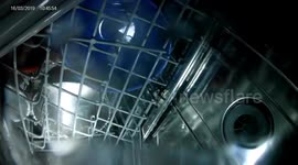 dishwasher operation from inside using a waterproof camera