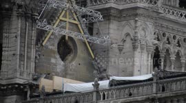 Notre-Dame covered in tarpaulin to protect it from expected rain