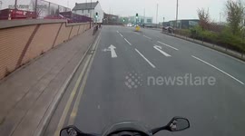 stupid pedestrial on mobile phone bad driving island giveway