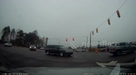 Cop pulling over red light runners who blocked an intersection