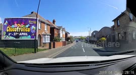 Near miss caught on dashcam car pulls out at roundabout