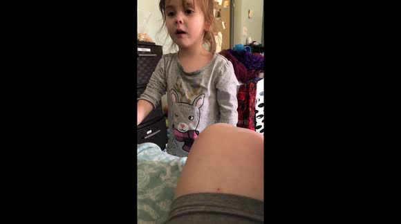 Cute moment girl aged 3 sings sweetly to baby sister to stop her from crying