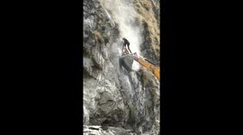 digging holes for blasting Rocks.