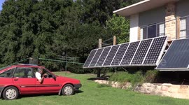 Nutty professor uses his car to adjust the angle of his solar panels