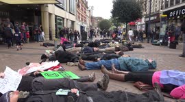 Protesters perform 'die-in' on West London high street