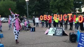 Protesters Chant, “Whitewash House!” in front of the White House
