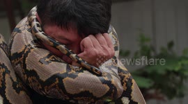 Brave Thai fireman shows how to escape a deadly python attack