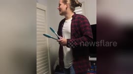 Canadian man armed with cooking tongs needs Aussie friend to remove critter