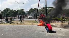 Military vehicle fires on civilians in Caracas clashes