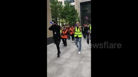 Employees of the catering service for London’s Facebook headquarters hold protest