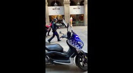 Drunk Liverpool fan being carried away by police