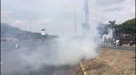 Caracas cashes - smoke in street