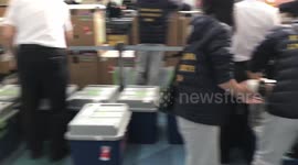 Students Check In Dozens Of Boxes At Airport