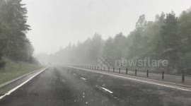 Springtime snow in May pelts car during Scottish Highland road trip