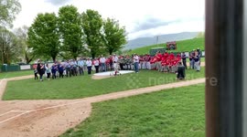 Touching moment boy with rare condition throws opening pitch of Little League season