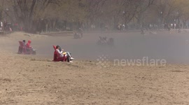 First warm day at Toronto beach and the sun had the water evaporating off the sand leaving thousands of people in clouds of steam as they enjoyed the nice weather