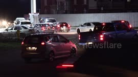 Chaos as hundreds of cars line up for cheap gas last night at a petrol station just north of Toronto