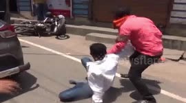 Slipper in hand, woman thrashes impostor who tried to steal money