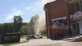 Huge dust devil rips through carpark in Lithuania