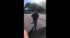 Nothing better to do than play football during a m6 traffic jam!