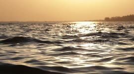 Water waves at a lake with sound stock footage