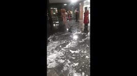 Drunk man slides naked on the stairs