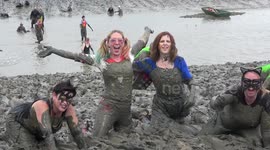 Hundreds of fancy-dress competitors get filthy in the annual Maldon Mud Race