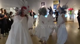 The Dethroning of Divine Beasts performance entrances visitors of Christies Auction House late night on 13 May 2019 - London