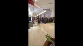 father's strict supervision of his son while on vacation at the mall