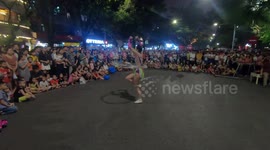 Performing shake art round on walking street
