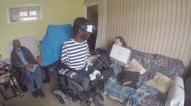 Wheelchair user playing with Samsung VR almost runs over feet