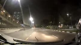 Pregnant woman stunned to see baby python riding on her car bonnet