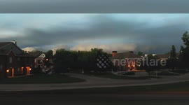 Kansas City suburb shrouded in darkness as storm clouds approach