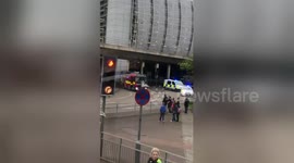 Newsflare Edit - Overturned ParcelForce lorry that fell off bridge onto roundabout