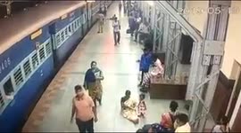 Brave cop saves a man after he slips trying to board a moving train in South India