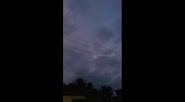 huge lightning flash hidden by clouds
