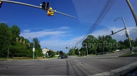 SUV Runs Redlight after Ambulance Crosses