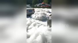 Smelly white foam bursting out of sewers submerges Chinese streets